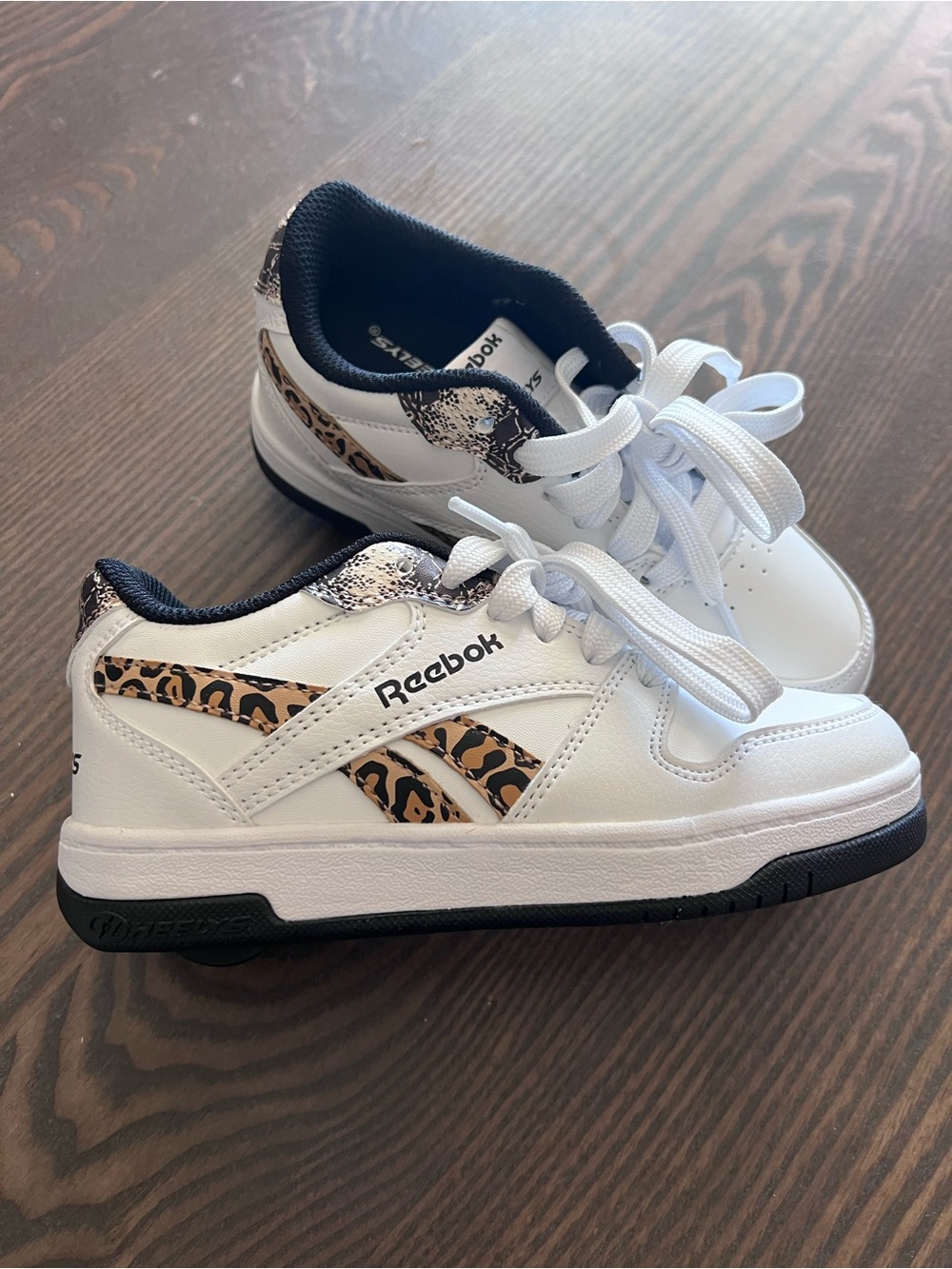 Reebok Heely’s  colab Kids' White Sneakers with Leopard Accent.